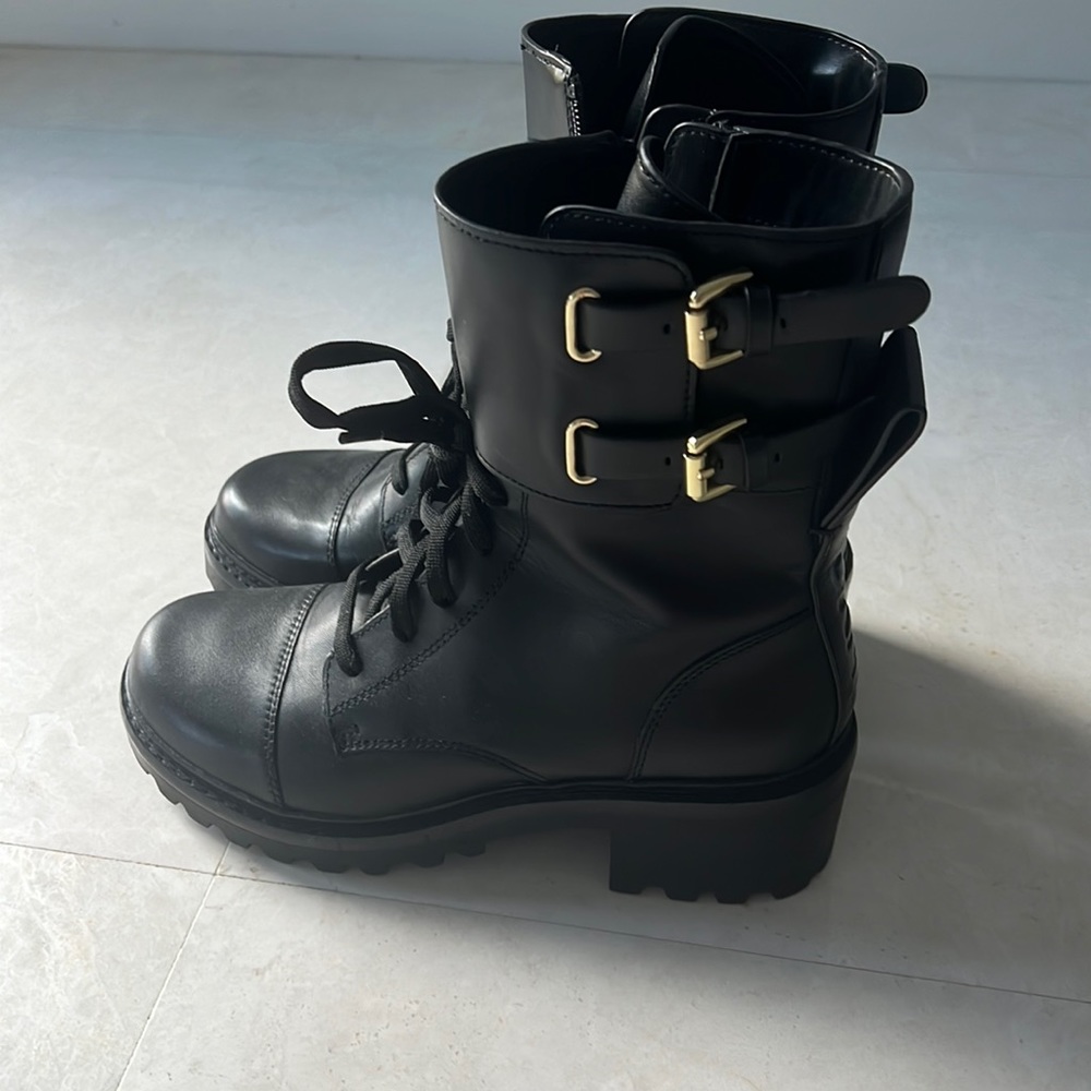 Brand new DKNY boots . Never wear it
